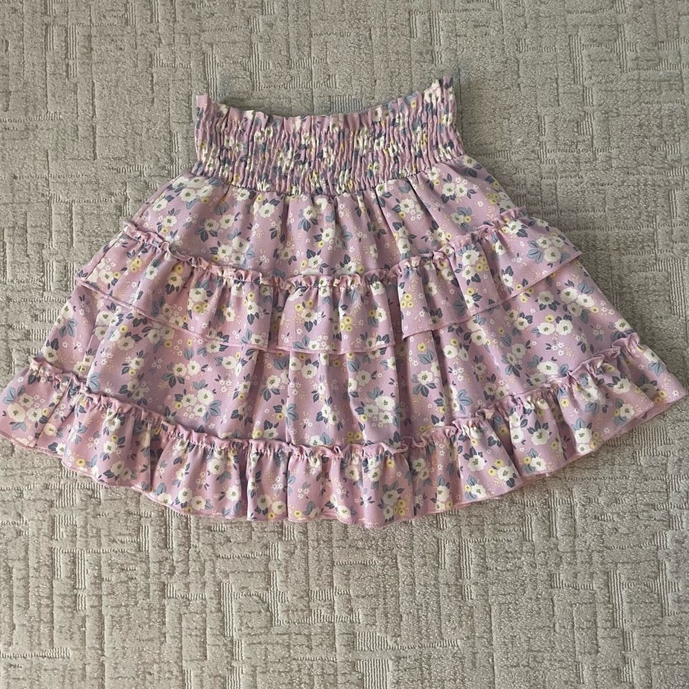 Purple ruffle skirt with flower print